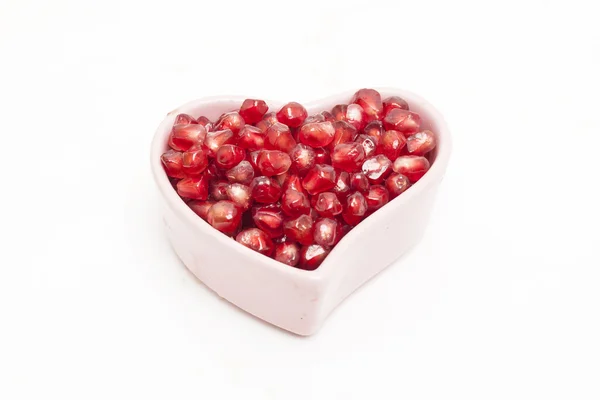 : Juicy pomegranate isolated on white background — Stock Photo, Image