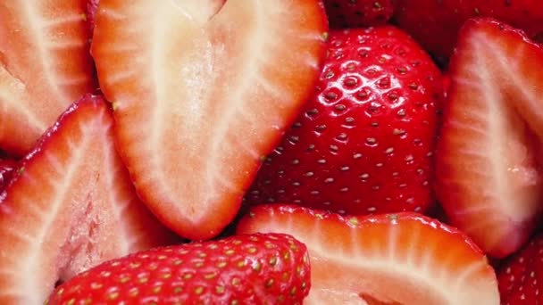 Strawberry Pieces Rotating Closeup — Stock Video