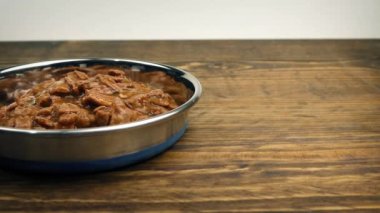 Pet Bowl With Delicious Meat And Gravy Meal
