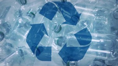 Recycling Symbol Over Plastic Bottles Pile Graphic
