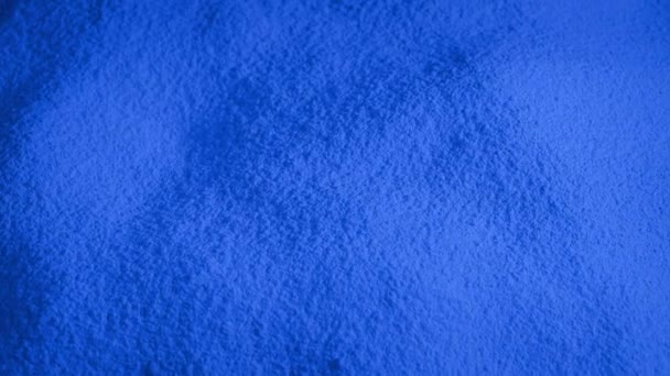 Γενόσημο Blue Powder Material Περιστρεφόμενο Αργά — Αρχείο Βίντεο