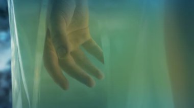 Cryosleep Tank With Hand Moving On Spaceship