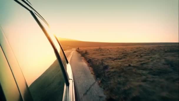 Driving Over Hill With Setting Sun — Stock Video