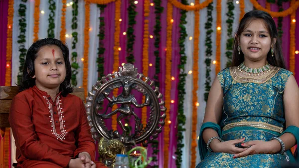 Indian children wearing ethnic Indian dress during Raksha Bandhan.