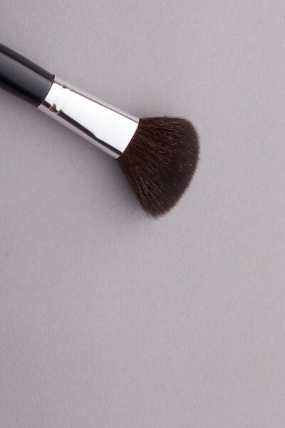 Beautiful makeup on a gray background.