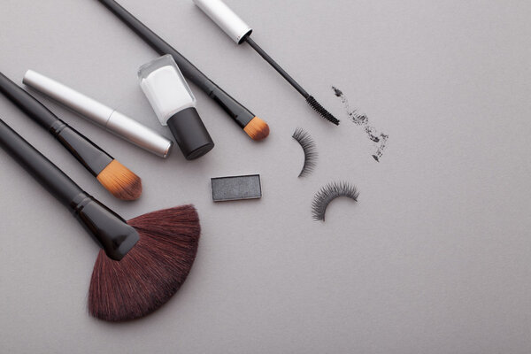 Beautiful makeup on a gray background.