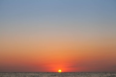 Peace and quiet on the seashore at sunset.
