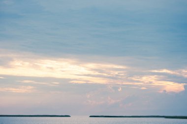 Peace and quiet on the seashore at sunset.