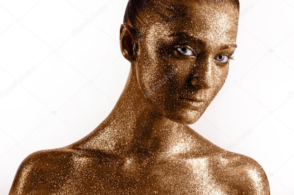 Face in gold. .