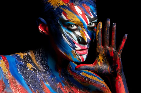 Paint on his face. — Stock Photo, Image