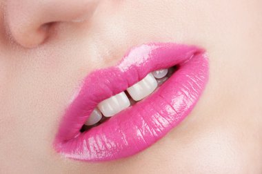 Trace of paint on the lips.