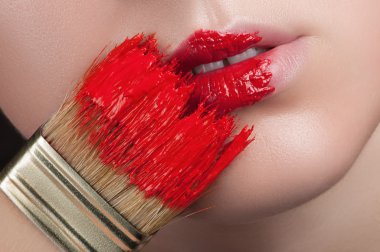Trace of paint on the lips.