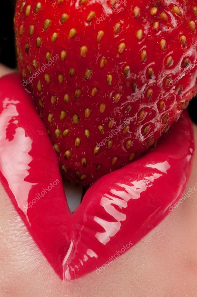 Sexy Woman Lips With Lip Gloss And Strawberry