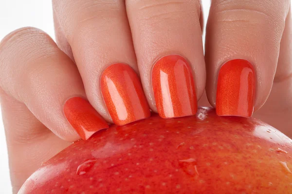 Pomarańczowy lakier do paznokci. — Zdjęcie stockowe