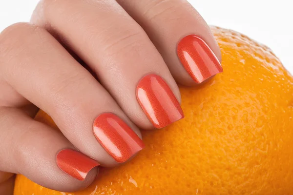 Esmalte de uñas naranja . — Foto de Stock
