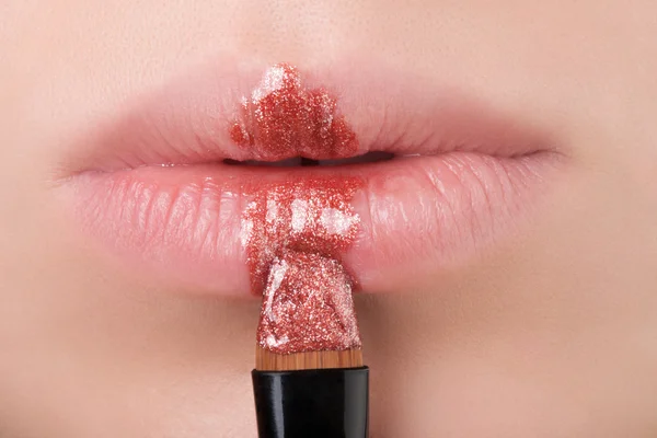 Bronzen lippen close-up. — Stockfoto