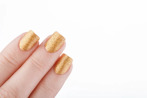 Mooie gouden manicure. — Stockfoto