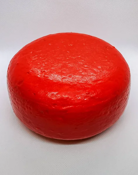 Wax-coated kaas wiel foto genomen in een lichtbak — Stockfoto