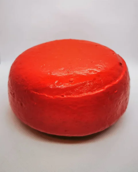 Wax-coated kaas wiel foto genomen in een lichtbak — Stockfoto