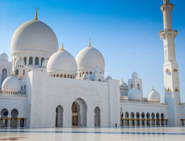 Sheikh Zayed Grand Mosque in Abu Dhabi, United Arab Emirates. One of largest mosques in the world. White marble domes and columns