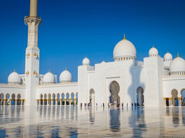 Sheikh Zayed Grand Mosque in Abu Dhabi, United Arab Emirates. One of largest mosques in the world. White marble domes and columns