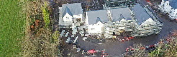 Hus utveckling byggarbetsplats pågår flygfoto — Stockfoto