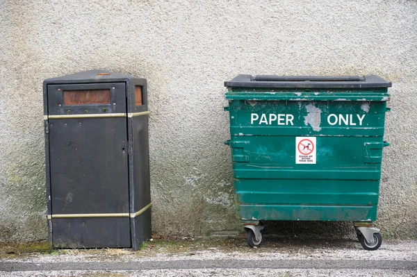 Recycling paper only bin and and general waste bin