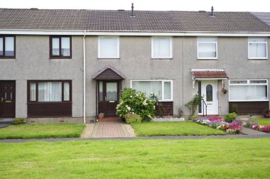 Port Glasgow 'da sosyal yardım sorunları olan fakir gecekondu mahallesindeki kimsesizler konağı.