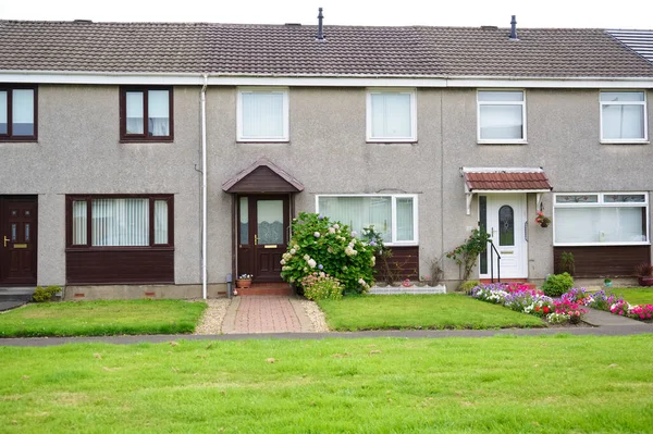 Port Glasgow 'da sosyal yardım sorunları olan fakir gecekondu mahallesindeki kimsesizler konağı.