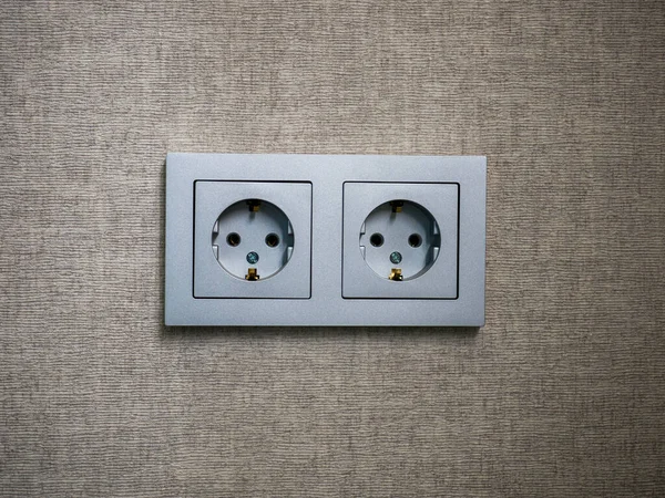 Close-up of a gray two module socket. Double electrical socket. — 图库照片