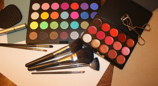 Set of cosmetic brushes and palette