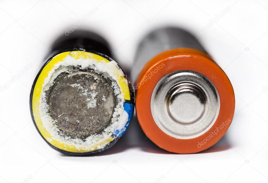 Used and leaking battery Stock Photo by ©photosampler 116517806