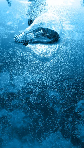 Blue bulb on water — Stock Photo, Image