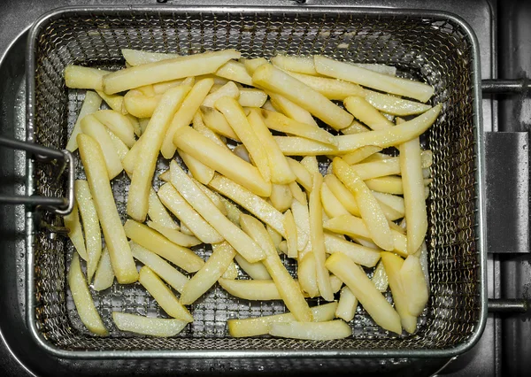 Deep frying fries — Stock Photo, Image