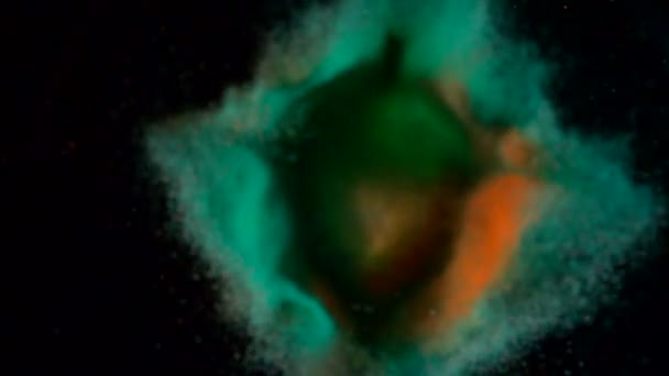 Colored particles fly after exploding — Stock Video