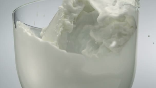 Milk poured in glass — Stock Video