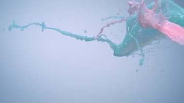 Havadaki sütlü yeşil ve pembe sıçrama