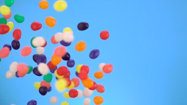 Colorful candy being thrown — Stock Video