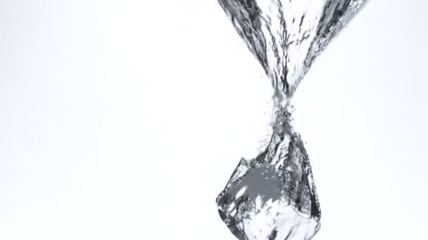 Ice cubes falling in water — Stock Video