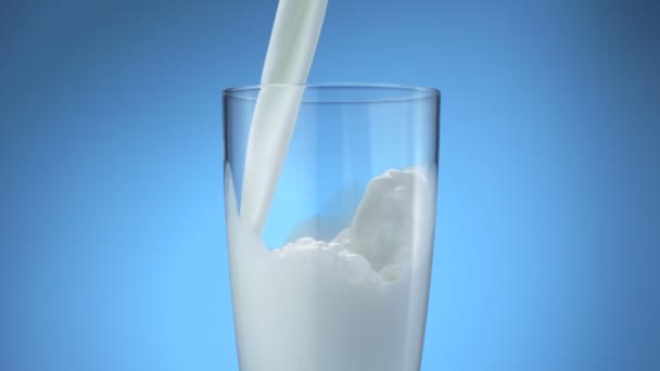 Milk pouring into glass — Stock Video