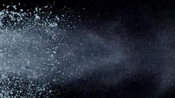 Flour explosion on black background — Stock Video