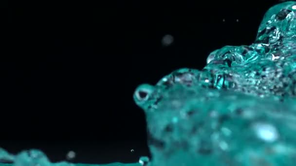 Salpicadura de agua de color — Vídeo de stock