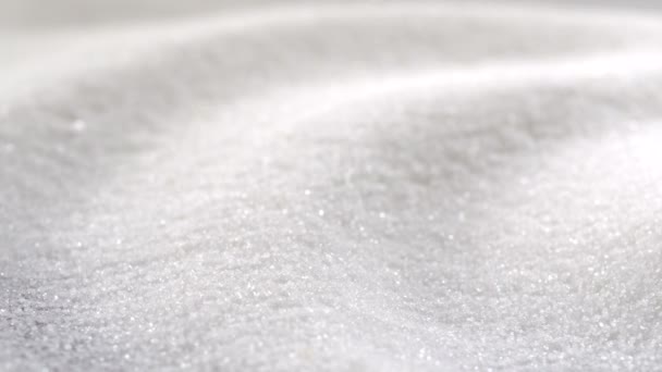 Pouring coffee into pile of sugar — Stock Video