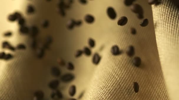 Dropping coffee beans — Stock Video