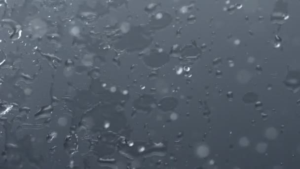 Water drops going down — Stock Video