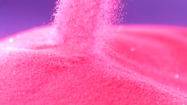 Stapel van roze gekleurd zand — Stockvideo