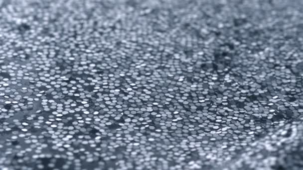 Vagues dans de l'eau remplie de paillettes — Video