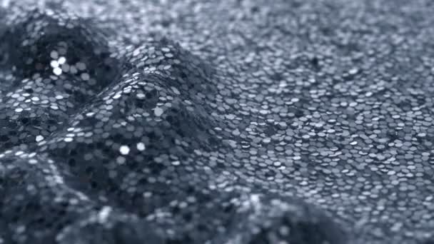 Waves in water filled with glitter — Stock Video