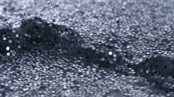 Waves in water filled with glitter — Stock Video