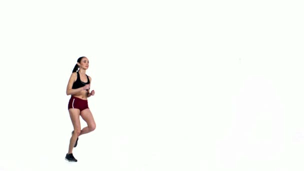 Joven jogging femenino — Vídeo de stock